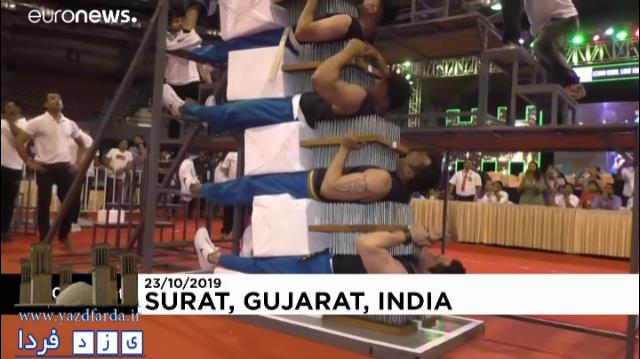 فیلم| رکورد بیشترین تعداد افراد چیده شده روی تخته‌های میخ‌دار شکسته شد